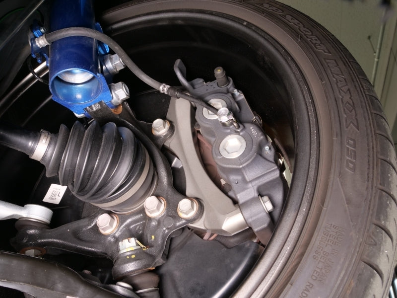 Cusco CUS1C7 770 F Cusco 23-25 Toyota GR Corolla Light Weight Front Brake Caliper Bracket - Billet Aluminum