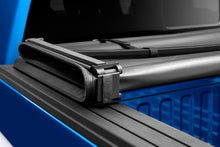 Load image into Gallery viewer, Lund 16-23 Nissan Titan (5.5ft. Bed w/o Titan Box) Genesis Tri-Fold Tonneau Cover - Black LUND
