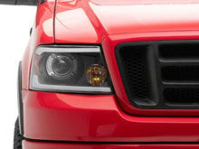Load image into Gallery viewer, Raxiom 04-08 Ford F-150 Axial Series Projector Headlights with LED Bar- Black Housing- Clear Lens | T566363

