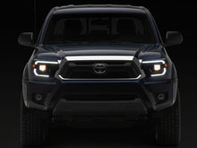 Load image into Gallery viewer, Raxiom 12-15 Toyota Tacoma Axial Series Switchback Projector Headlights- Black Housing- Clear Lens | TT23359
