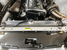 Load image into Gallery viewer, GReddy Nissan Skyline GT-R BCNR33 Radiator Mount Bracket- Black | 12023903
