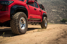 Load image into Gallery viewer, DV8 Offroad 24-25 Toyota Tacoma Double Cab Rock Sliders
