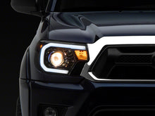 Load image into Gallery viewer, Raxiom 12-15 Toyota Tacoma Axial Series Projector Headlights w/ LED Bar- Blk Housing (Clear Lens) Headlights Raxiom
