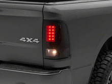 Load image into Gallery viewer, Raxiom 09-18 Dodge RAM 1500/2500/3500 Axial Series LED Tail Lights- BlkHousing- SmokedLens Tail Lights Raxiom
