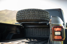 Load image into Gallery viewer, DV8 Offroad 2020+ Jeep Gladiator JT Adjustable In-Bed Tire Carrier
