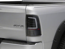 Load image into Gallery viewer, Raxiom 09-18 Dodge RAM 1500 Axial Series LED Tail Lights- Black Housing- Clear Lens | R113541
