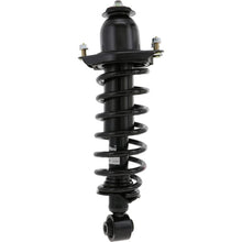 Load image into Gallery viewer, KYB Shocks and Struts KYB Shocks &amp; Struts Strut-Plus 05-10 Scion TC - Rear Left
