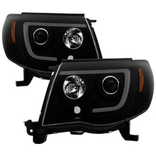 Load image into Gallery viewer, Spyder Auto Headlight Set Spyder Auto 5085771 Projector Headlights - Version 2 - Light Bar DRL - Black Smoke

