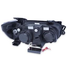 Load image into Gallery viewer, ANZO 2012-2015 Chevrolet Sonic Projector Headlights w/ Halo Black (CCFL) Headlights ANZO
