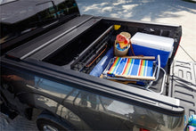 Load image into Gallery viewer, Roll-N-Lock 15-17 Chevy Silverado/Sierra 2500/3500 77-3/8in E-Series Retractable Tonneau Cover Tonneau Covers - Retractable Roll-N-Lock
