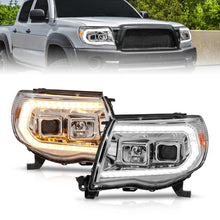 Load image into Gallery viewer, ANZO 05-11 Toyota Tacoma Projector Headlights w/Light Bar Switchback Chrome Housing Headlights ANZO
