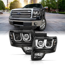 Load image into Gallery viewer, ANZO 2009-2014 Ford F-150 Projector Headlights w/ U-Bar Switchback Black w/ Amber Headlights ANZO
