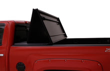 Load image into Gallery viewer, Lund 04-15 Nissan Titan (5.5ft. Bed) Hard Fold Tonneau Cover w/Bracket Kit - Black Tonneau Covers - Hard Fold LUND
