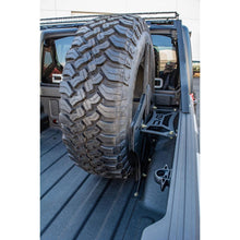 Load image into Gallery viewer, DV8 Offroad 2019+ Jeep Gladiator Universal Stand Up In-Bed Tire Carrier Chase Racks DV8 Offroad
