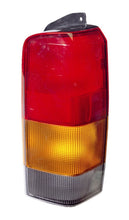 Load image into Gallery viewer, Omix Right Tail Lamp 97-01 Jeep Cherokee (XJ) Tail Lights OMIX

