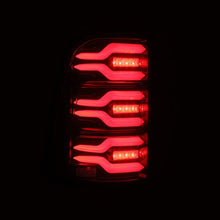 Load image into Gallery viewer, AlphaRex 19-21 Dodge Ram 1500 Luxx-Series LED Tail Lights Black/Red w/Activ Light/Seq Signal Tail Lights AlphaRex
