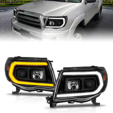 Load image into Gallery viewer, ANZO 05-11 Toyota Tacoma Projector Headlights w/Light Bar Switchback Black Housing Headlights ANZO
