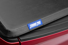 Load image into Gallery viewer, Tonno Pro 04-15 Nissan Titan 5.5ft (Incl 42-498 Utility Track Kit) Hard Fold Tonneau Cover Tonneau Covers - Hard Fold Tonno Pro
