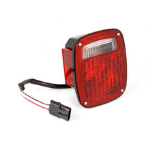 Load image into Gallery viewer, Omix Tail Light LH 98-06 Jeep Wrangler TJ Tail Lights OMIX
