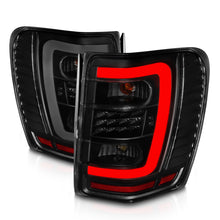 Load image into Gallery viewer, ANZO 1999-2004 Jeep Grand Cherokee LED Tail Lights w/ Light Bar Black Housing Smoke Lens Tail Lights ANZO
