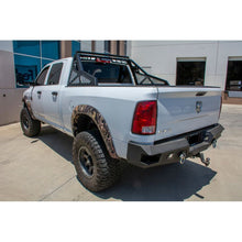 Load image into Gallery viewer, DV8 Offroad 10-18 Ram 2500/3500 Bolt On Chase Rack Chase Racks DV8 Offroad
