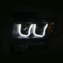 Load image into Gallery viewer, ANZO 2009-2014 Ford F-150 Projector Headlights w/ U-Bar Switchback Black w/ Amber Headlights ANZO
