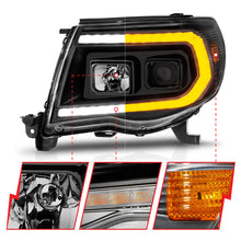 Load image into Gallery viewer, ANZO 05-11 Toyota Tacoma Projector Headlights w/Light Bar Switchback Black Housing Headlights ANZO
