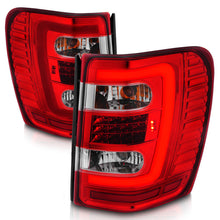 Load image into Gallery viewer, ANZO 1999-2004 Jeep Grand Cherokee LED Tail Lights w/ Light Bar Chrome Housing Red/Clear Lens Tail Lights ANZO
