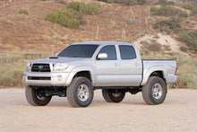 Load image into Gallery viewer, Fabtech 05-14 Toyota Tacoma 4WD/ 2WD 6 Lug Models Only 6in Basic Sys w/Perf Shks Lift Kits Fabtech
