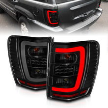 Load image into Gallery viewer, ANZO 1999-2004 Jeep Grand Cherokee LED Tail Lights w/ Light Bar Black Housing Smoke Lens Tail Lights ANZO
