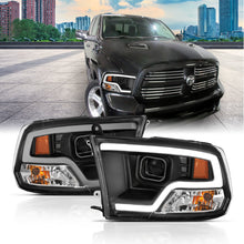 Load image into Gallery viewer, ANZO 09-18 Dodge Ram 1500 Plank Style Projector Headlights Black w/ Halo Headlights ANZO
