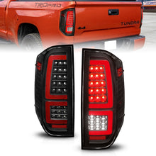 Load image into Gallery viewer, ANZO 2014-2021 Toyota Tundra LED Taillights Black Housing/Clear Lens Tail Lights ANZO
