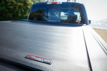 Load image into Gallery viewer, Roll-N-Lock 2020 Chevy Silverado / GMC Sierra 2500-3500 77-3/8in E-Series Retractable Tonneau Cover Tonneau Covers - Retractable Roll-N-Lock
