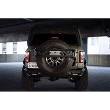 Load image into Gallery viewer, DV8 Offroad 21-23 Ford Bronco Spare Tire Guard &amp; Accessory Mount Hitch Receivers DV8 Offroad
