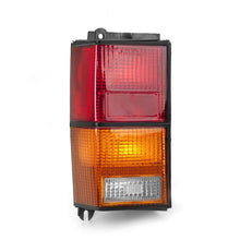 Load image into Gallery viewer, Omix Left Tail Lamp 84-96 Jeep Cherokee (XJ) Tail Lights OMIX
