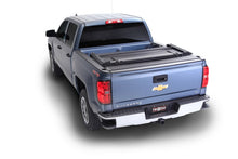 Load image into Gallery viewer, Truxedo 04-15 Nissan Titan 5ft 6in Deuce Bed Cover Bed Covers - Folding Truxedo
