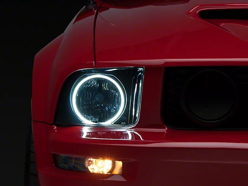 Raxiom 05-09 Ford Mustang GT V6 Axial Series CCFL Halo Projector Headlight- Blk Housing (Smkd Lens) Headlights Raxiom