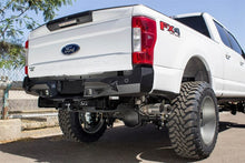 Load image into Gallery viewer, Addictive Desert Designs ADDR161231280103 Addictive Desert Designs 17-18 Ford F-250 Raptor Stealth Fighter Rear Bumper w/ Backup Sensor Cutout
