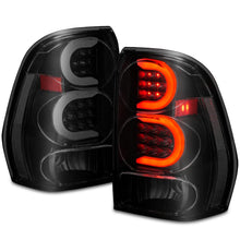 Load image into Gallery viewer, ANZO ANZ311372 ANZO 2002-2009 Chevrolet Trailblazer LED Tail Lights w/ Light Bar Black Housing Smoke Lens
