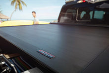 Load image into Gallery viewer, Roll-N-Lock 07-17 Toyota Tundra Regular Cab/Double Cab 77in E-Series Retractable Tonneau Cover Tonneau Covers - Retractable Roll-N-Lock
