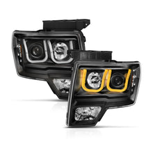 Load image into Gallery viewer, ANZO 2009-2014 Ford F-150 Projector Headlights w/ U-Bar Switchback Black w/ Amber Headlights ANZO
