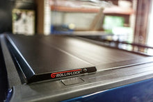 Load image into Gallery viewer, Roll-N-Lock 07-17 Toyota Tundra Crew Max Cab 65in E-Series Retractable Tonneau Cover Tonneau Covers - Retractable Roll-N-Lock
