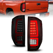 Load image into Gallery viewer, ANZO 2014-2021 Toyota Tundra LED Taillights Black Housing/Smoke Lens Tail Lights ANZO
