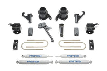 Load image into Gallery viewer, Fabtech 13-18 Ram 3500 4WD w/Factory Radius Arms 5in Basic System w/Perf. Shocks Lift Kits Fabtech
