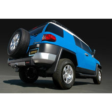 Load image into Gallery viewer, Gibson 07-14 Toyota FJ Cruiser Base 4.0L 2.5in Cat-Back Single Exhaust - Stainless Catback Gibson
