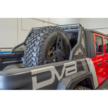 Load image into Gallery viewer, DV8 Offroad 2019+ Jeep Gladiator Universal Stand Up In-Bed Tire Carrier Chase Racks DV8 Offroad

