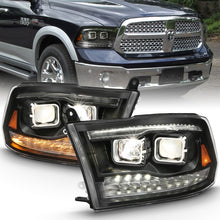 Load image into Gallery viewer, ANZO 2009-2018 Dodge Ram 1500 Projector H.L. Switchback Chrome Amber Headlights ANZO
