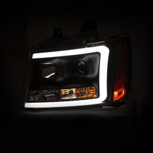 Load image into Gallery viewer, ANZO 07-14 Chevy Tahoe Projector Headlights w/ Plank Style Design Black w/ Amber Headlights ANZO
