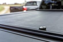 Load image into Gallery viewer, Roll-N-Lock 2020 Chevy Silverado / GMC Sierra 2500-3500 80-1/2in M-Series Retractable Tonneau Cover Tonneau Covers - Retractable Roll-N-Lock
