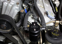 Load image into Gallery viewer, J&amp;L 99-04 Ford Mustang SVT Cobra Driver Side Oil Separator 3.0 - Black Anodized Oil Separators J&amp;L
